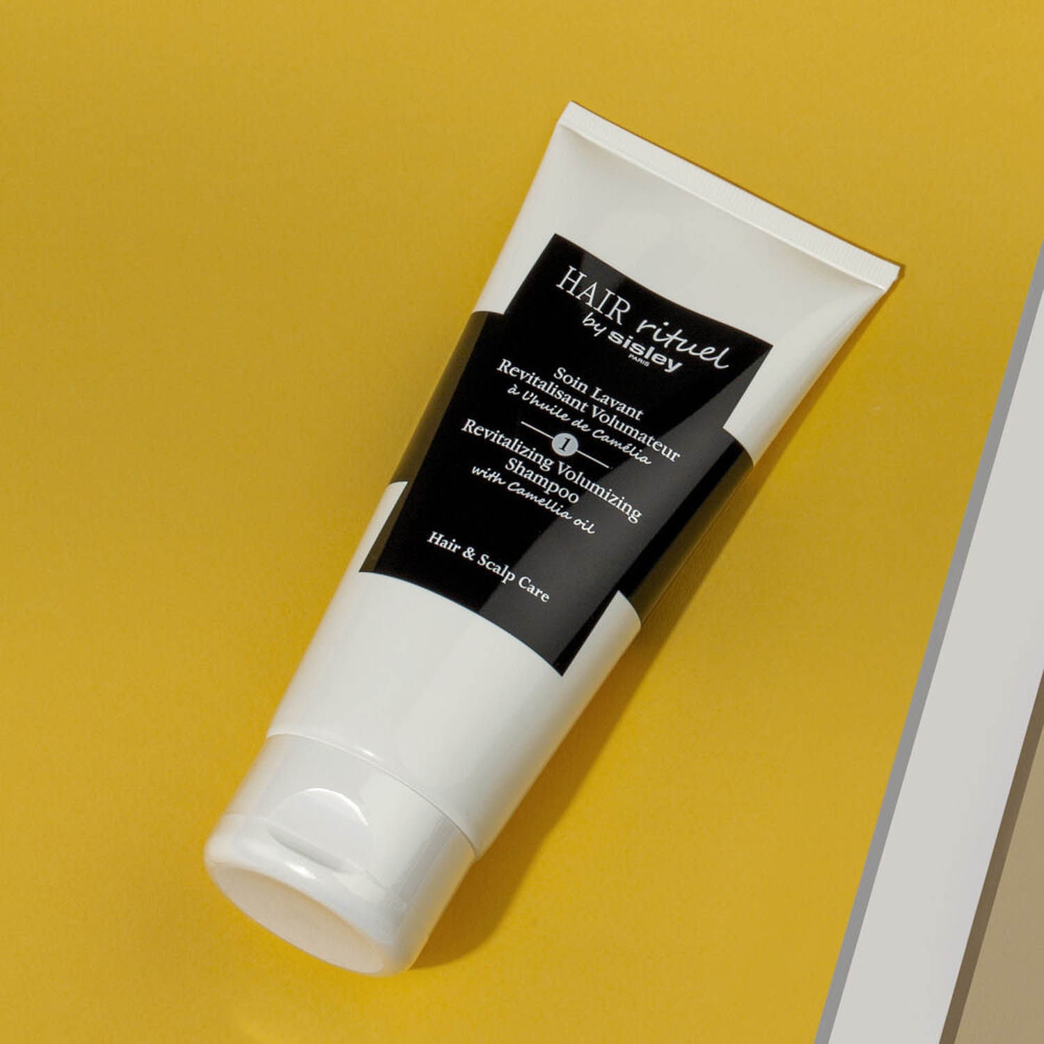 REVITALIZING VOLUMIZING SHAMPOO WITH CAMELLIA OIL